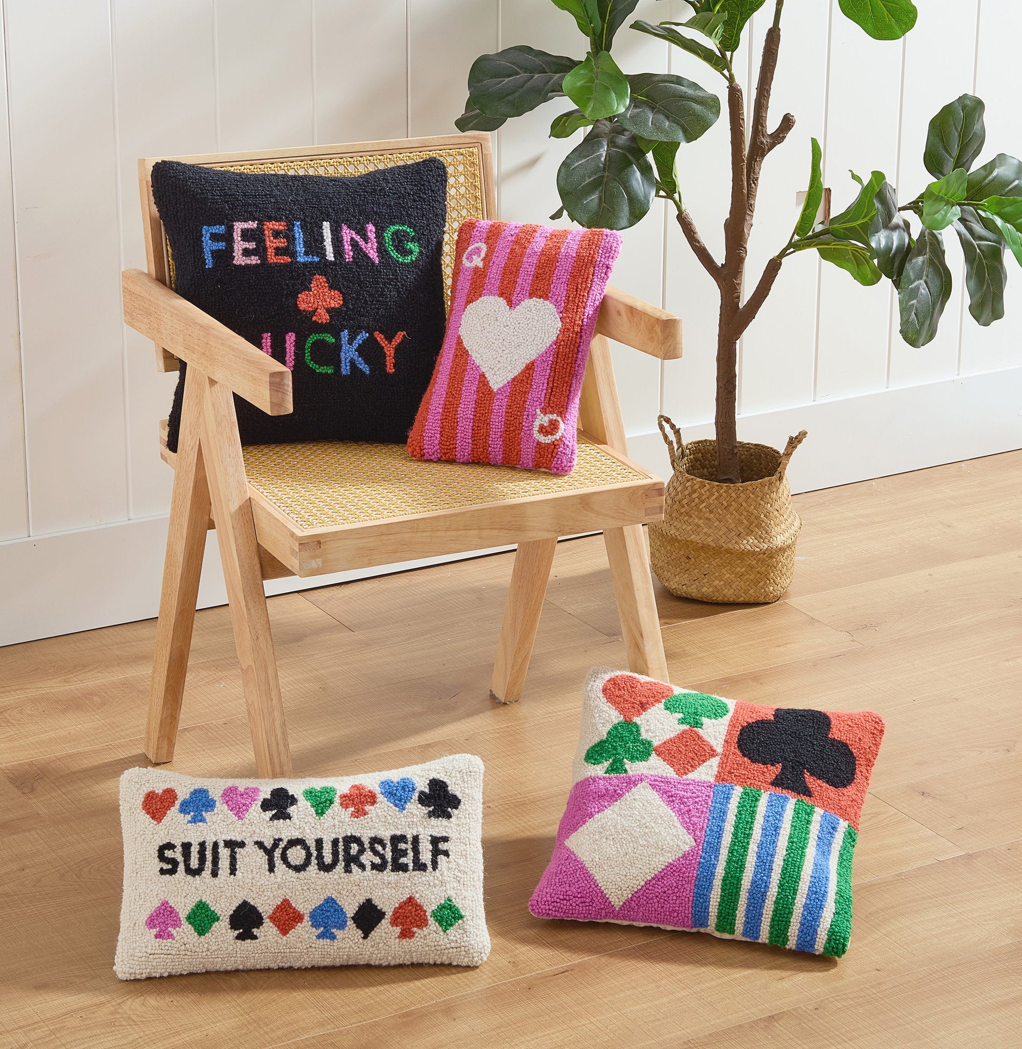 Feeling Lucky Hooked Wool Throw Pillow shown alongside other designs in the same collection, 14x14 inch