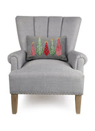 Felt Christmas Tree Embroidered Throw Pillow on an armchair, showing the throw pillow at room scale, 12x18 inch