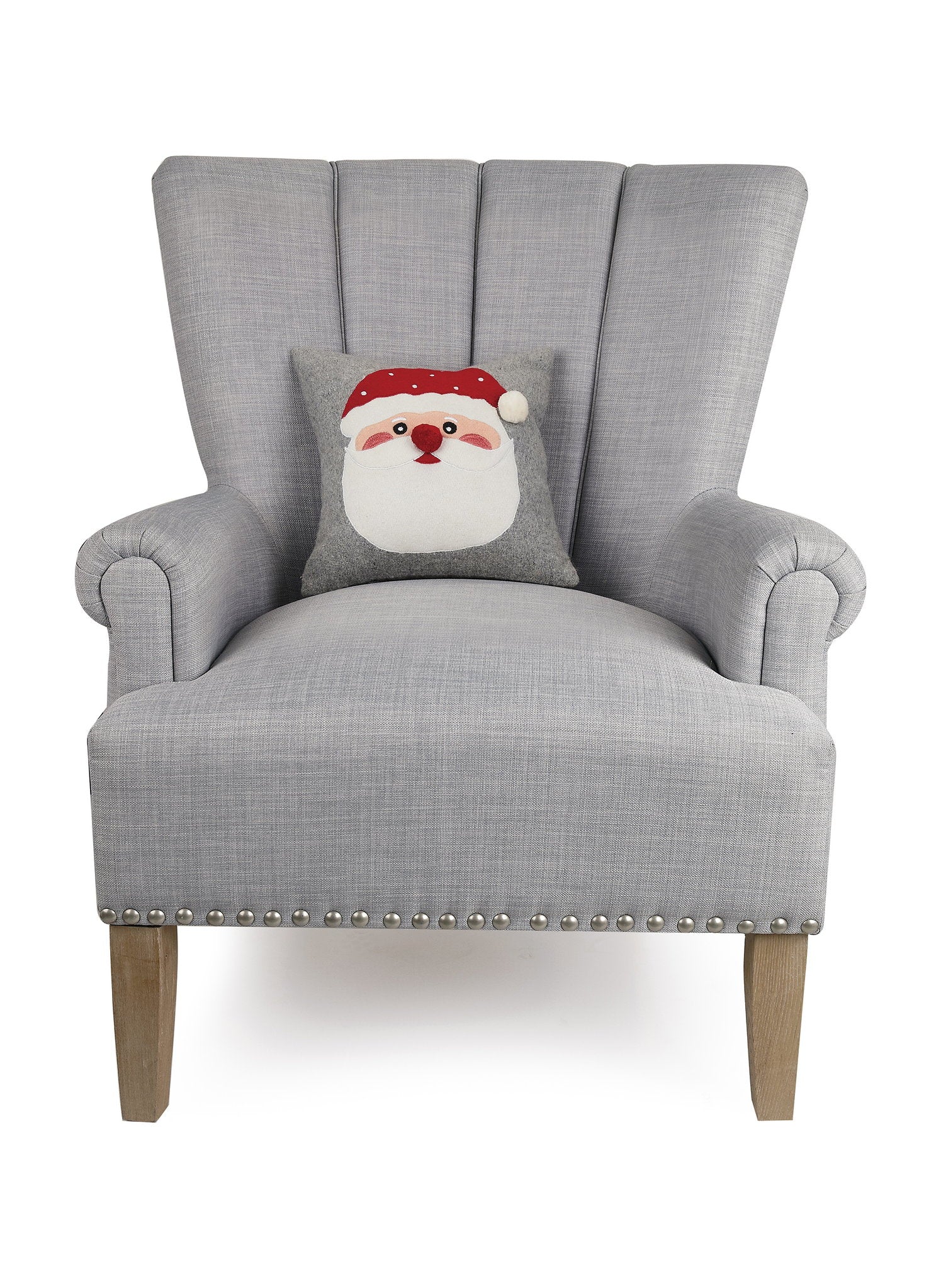 Felt Santa Embroidered Christmas Throw Pillow on an armchair, showing the throw pillow at room scale, 12x12 inch
