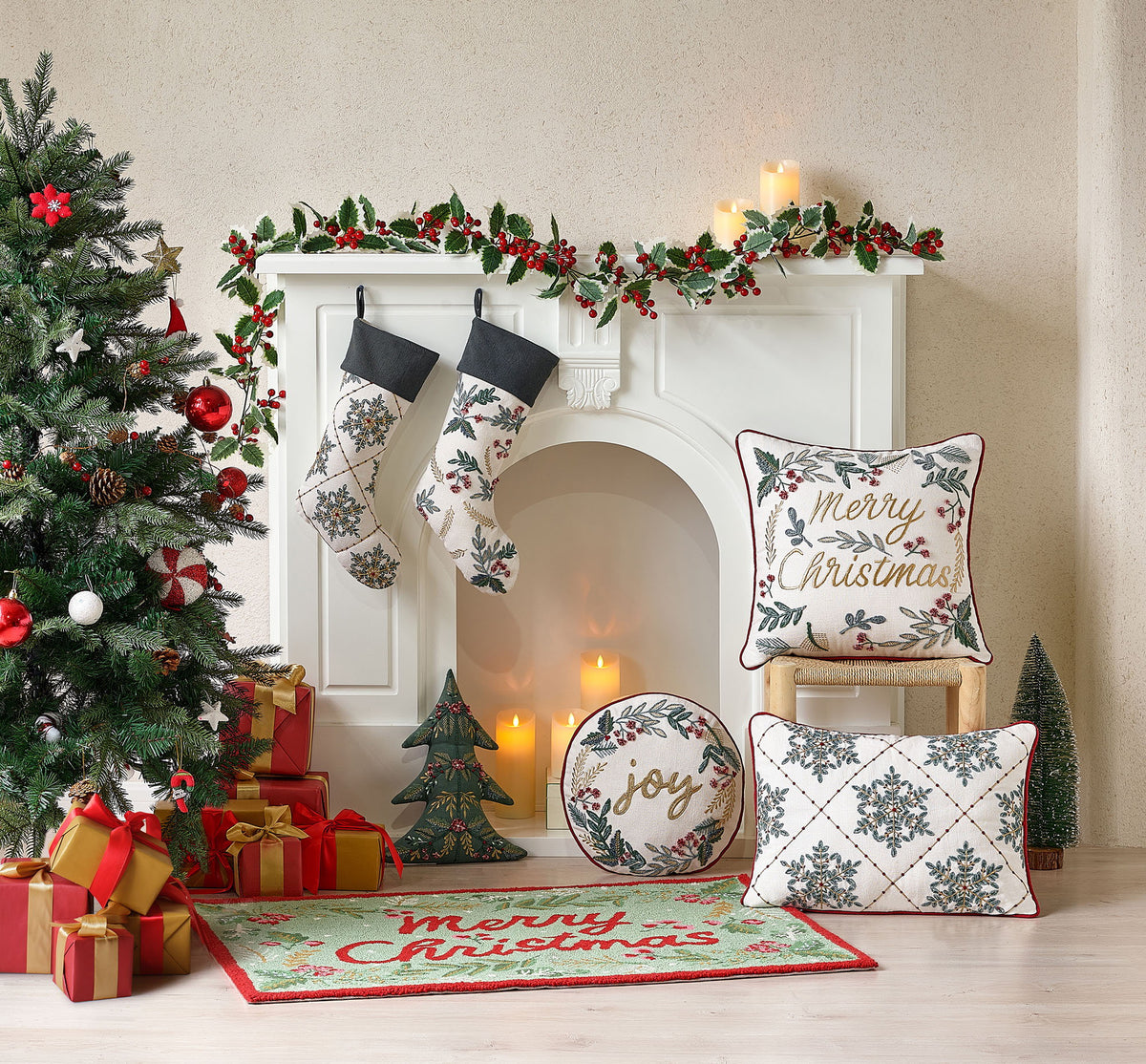 Festive Greenery Embroidered Christmas Stocking shown alongside other designs in the same collection, 11x20 inch