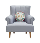 Festive Greenery Joy Filled Embroidered Christmas Throw Pillow on an armchair, showing the throw pillow at room scale, 14x14 inch