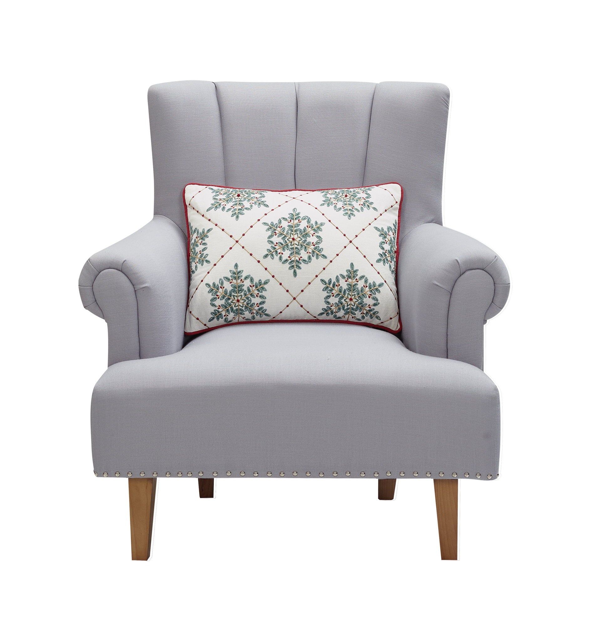 Festive Greenery Snowflakes Embroidered Christmas Throw Pillow on an armchair, showing the throw pillow at room scale, 14x20 inch