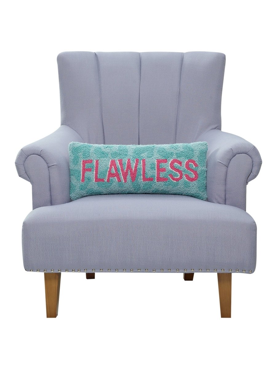 Flawless Hooked Wool Throw Pillow on an armchair, showing the throw pillow at room scale, 8x20 inch