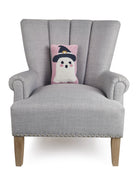 Ghost Witch Hooked Wool Halloween Throw Pillow on an armchair, showing the throw pillow at room scale, 8x12 inch