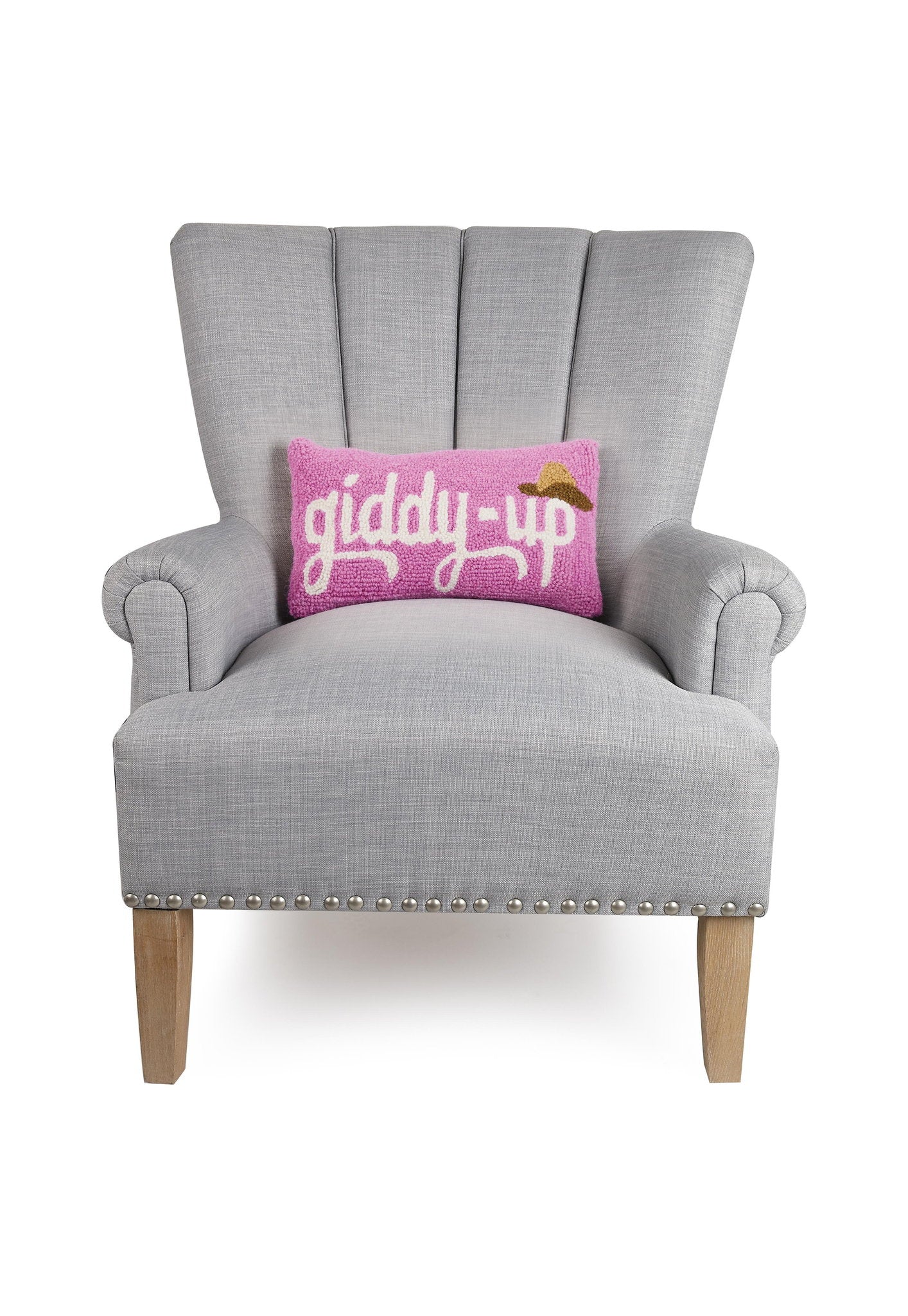 Giddy Up Hat Hooked Wool Throw Pillow on an armchair, showing the throw pillow at room scale, 9x16 inch