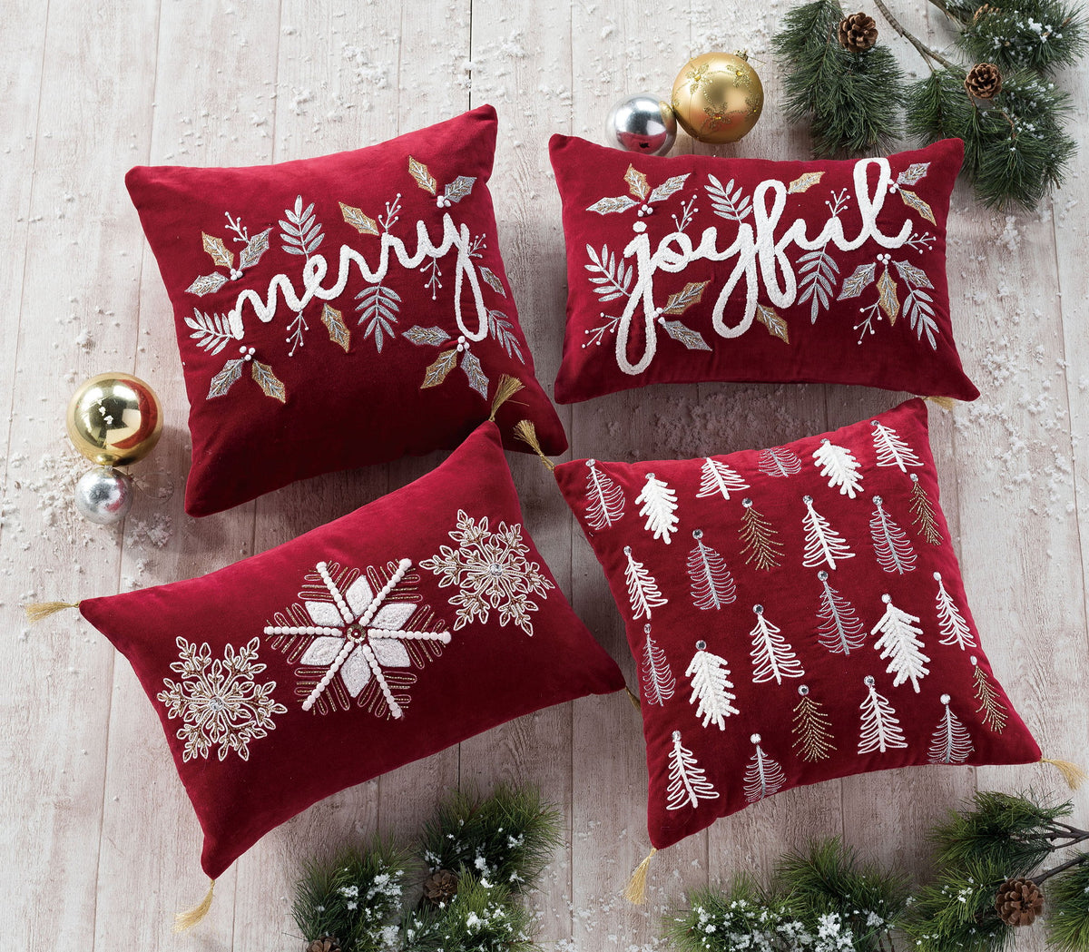 Gilded Joyful Embroidered Christmas Throw Pillow shown alongside other designs in the same collection, 12x18 inch