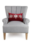 Gilded Snowflakes Embroidered Christmas Throw Pillow on an armchair, showing the throw pillow at room scale, 12x18 inch