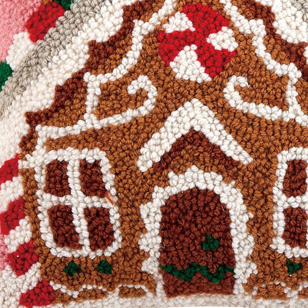 Closeup of Gingerbread House Candycane Hooked Wool Christmas Throw Pillow showing stitch texture and craftsmanship detail