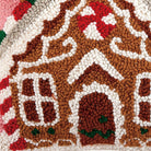 Closeup of Gingerbread House Candycane Hooked Wool Christmas Throw Pillow showing stitch texture and craftsmanship detail