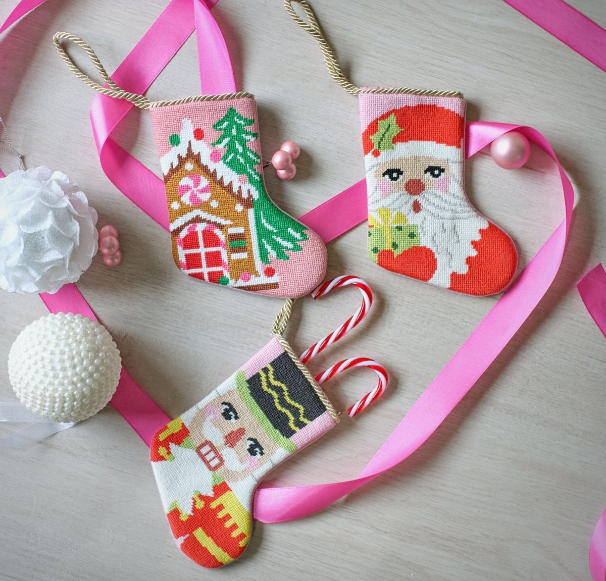 Gingerbread House Mini Embroidered Needlepoint Christmas Stocking, 6x4 inch, four mini stockings on pink ribbon with white ornaments