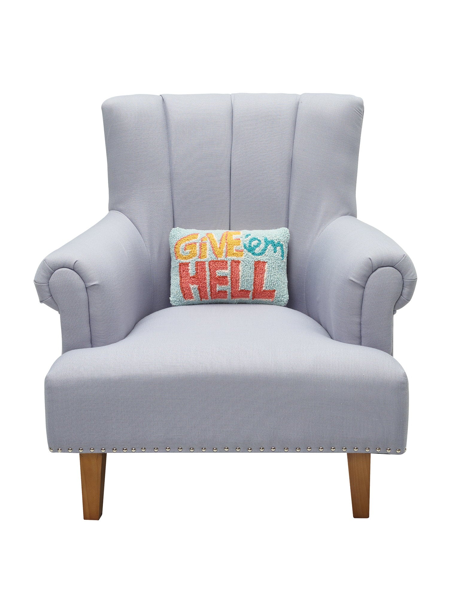 Give'em Hell Hooked Wool Throw Pillow on an armchair, showing the throw pillow at room scale, 8x12 inch