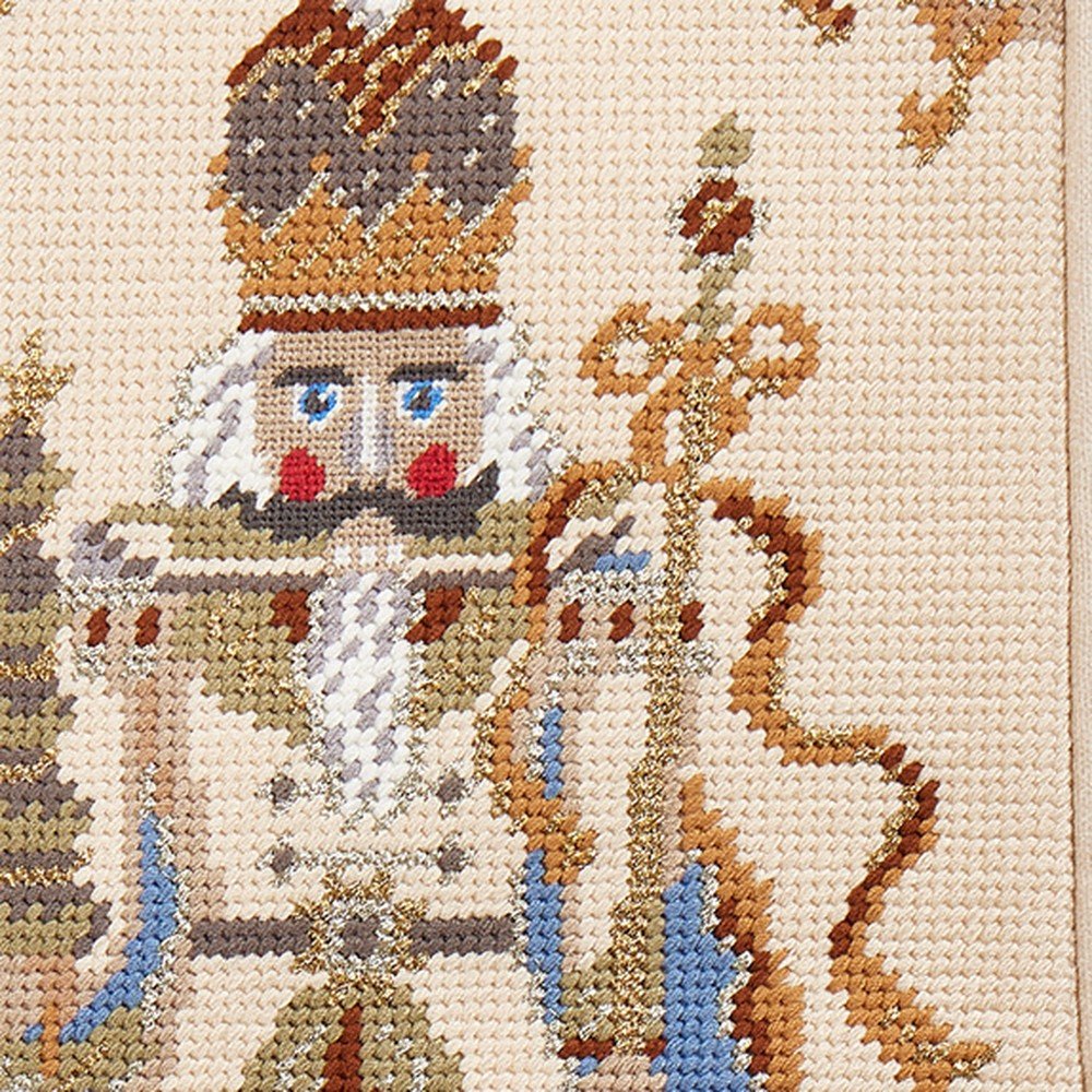Closeup of Gold Scroll Blue Nutcracker Embroidered Needlepoint Christmas Stocking showing stitch texture and craftsmanship detail