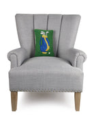 Golf Hooked Wool Throw Pillow on an armchair, showing the throw pillow at room scale, 8x12 inch