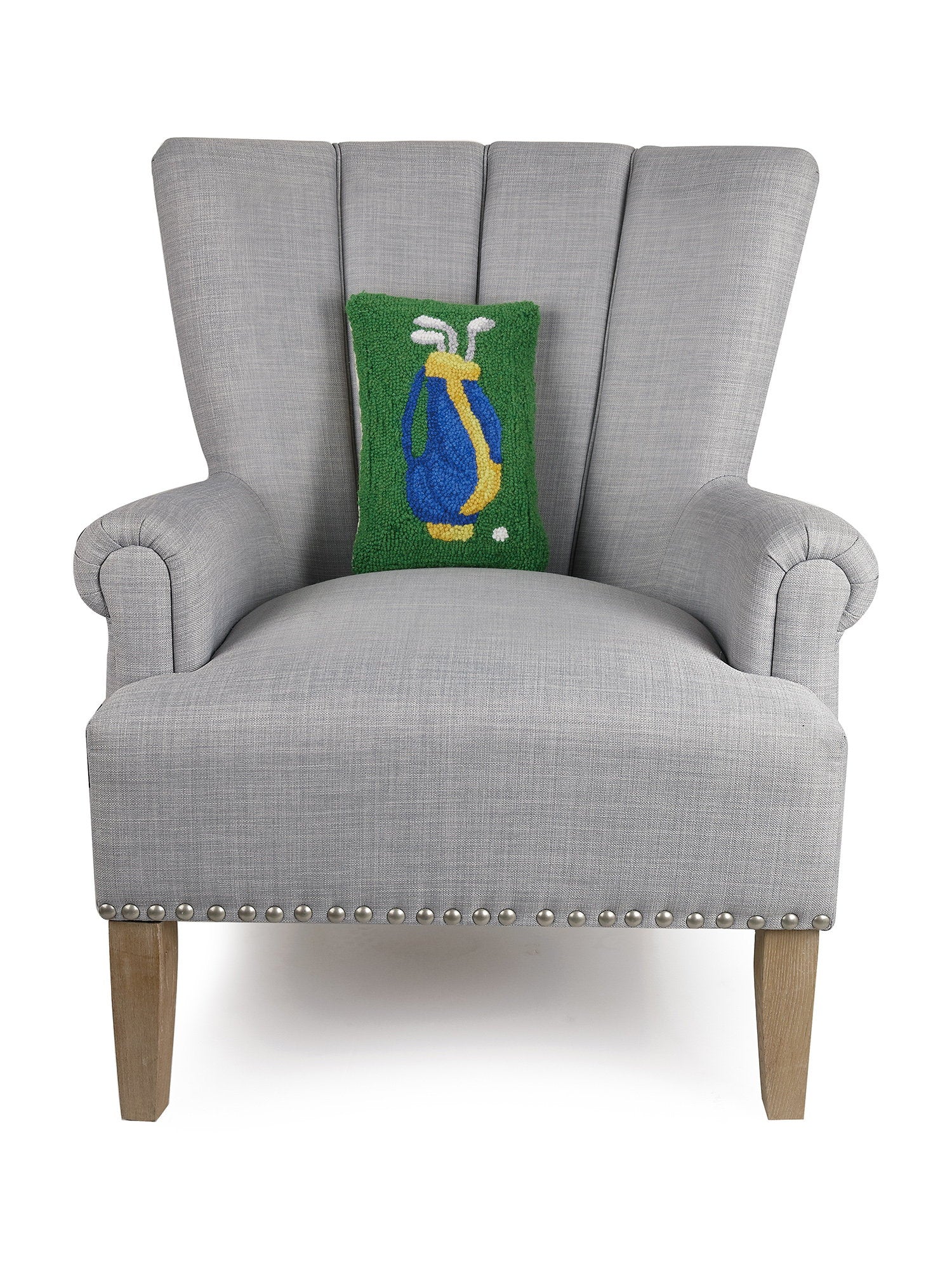 Golf Hooked Wool Throw Pillow on an armchair, showing the throw pillow at room scale, 8x12 inch