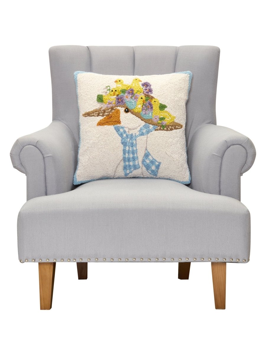 Goose Hooked Wool Throw Pillow on an armchair, showing the throw pillow at room scale, 18x18 inch