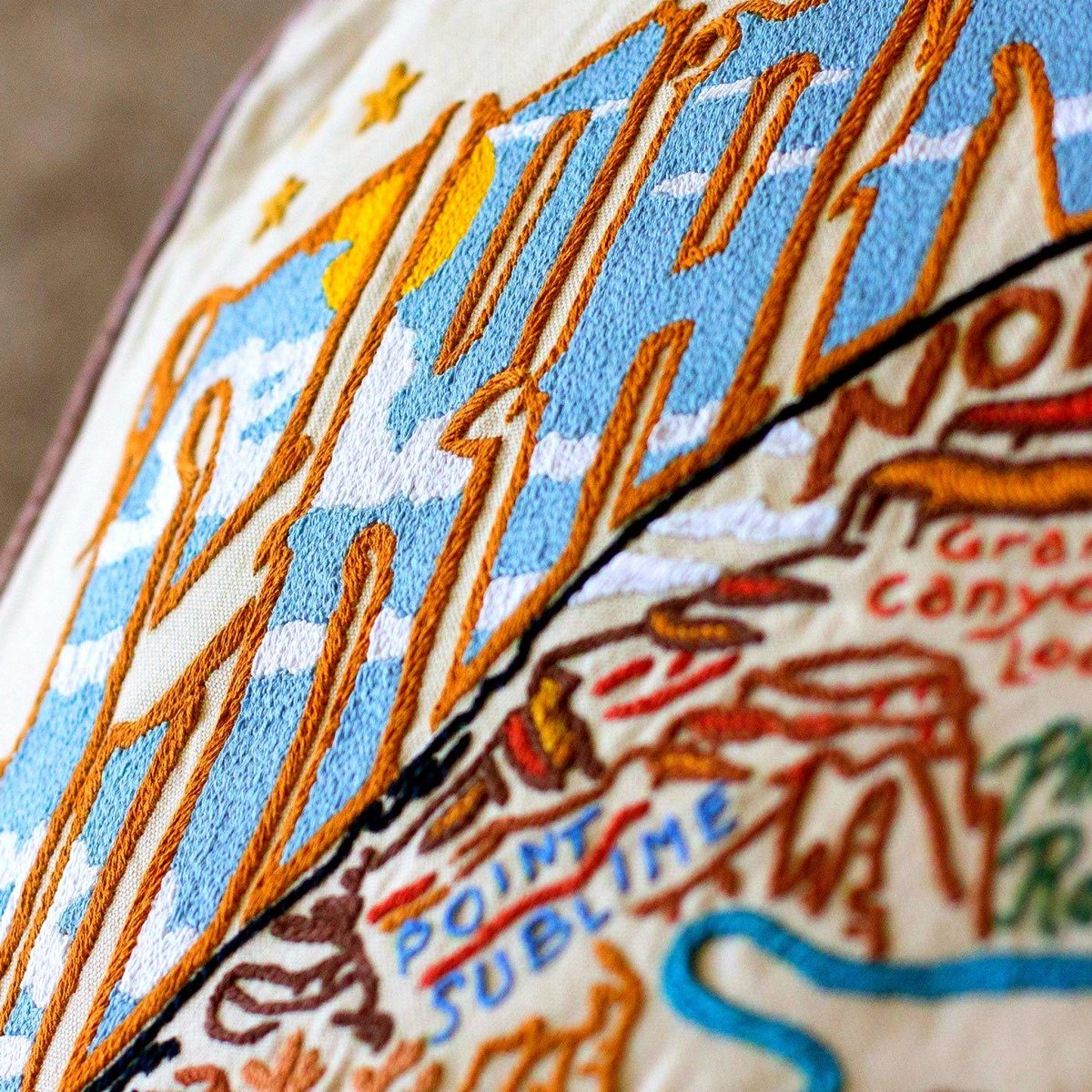 Grand Canyon Red Rocks National Park Embroidered Pillow - close-up detail of hand-embroidered needlepoint stitching
