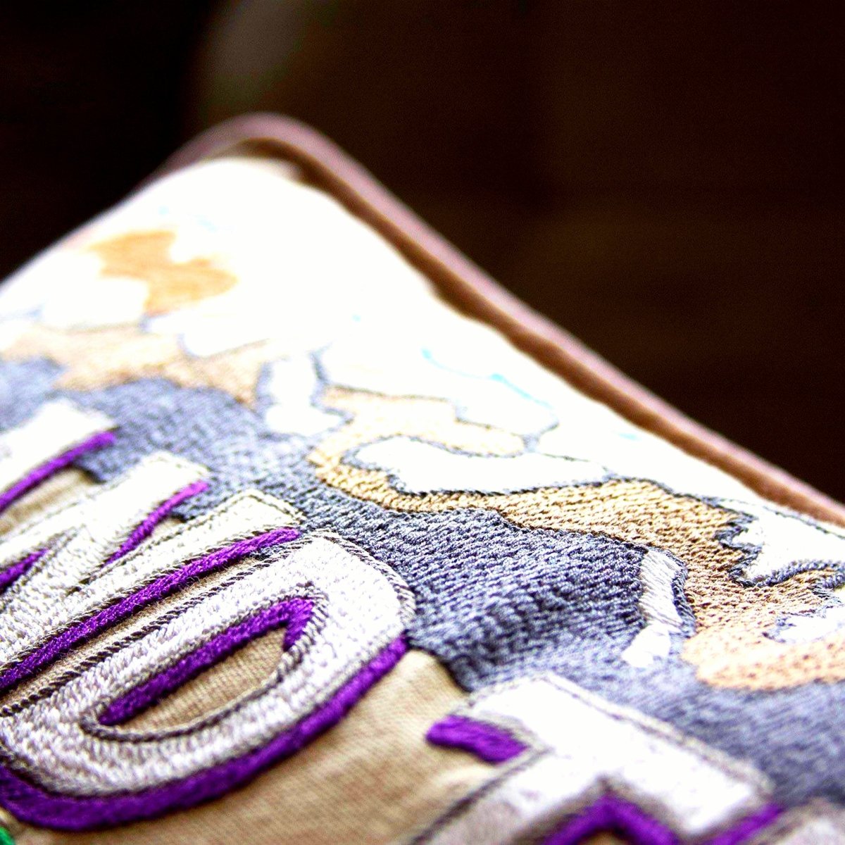 Grand Teton Mountain Range National Park Embroidered Pillow - close-up detail of hand-embroidered needlepoint stitching