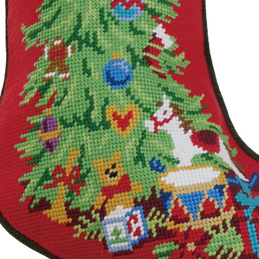 Closeup of Green Cuff Christmas Tree Embroidered Needlepoint Stocking showing stitch texture and craftsmanship detail