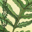 Closeup of Green Fern Plant Designer needlepoint throw pillow highlighting hand-stitched wool craftsmanship and fabric detail
