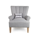 Grey Stripe Homebody Crewel Embroidered Throw Pillow on an armchair, showing the throw pillow at room scale, 8x12 inch