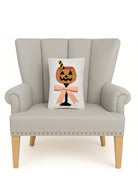 Halloween Drink Hooked Wool Throw Pillow on an armchair, showing the throw pillow at room scale, 8x12 inch