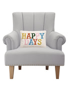 Happy Days Hooked Wool Throw Pillow on an armchair, showing the throw pillow at room scale, 8x12 inch