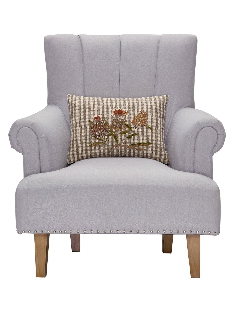 Harvest Flower Embroidered Fall Harvest Throw Pillow on an armchair, showing the throw pillow at room scale, 12x18 inch