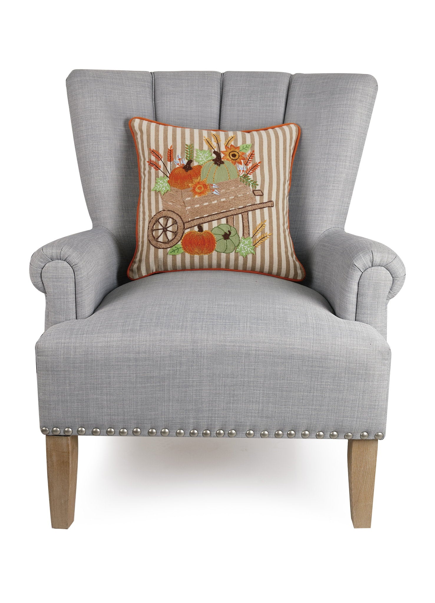 Harvest Pumpkin Cart Embroidered Fall Harvest Throw Pillow on an armchair, showing the throw pillow at room scale, 16x16 inch