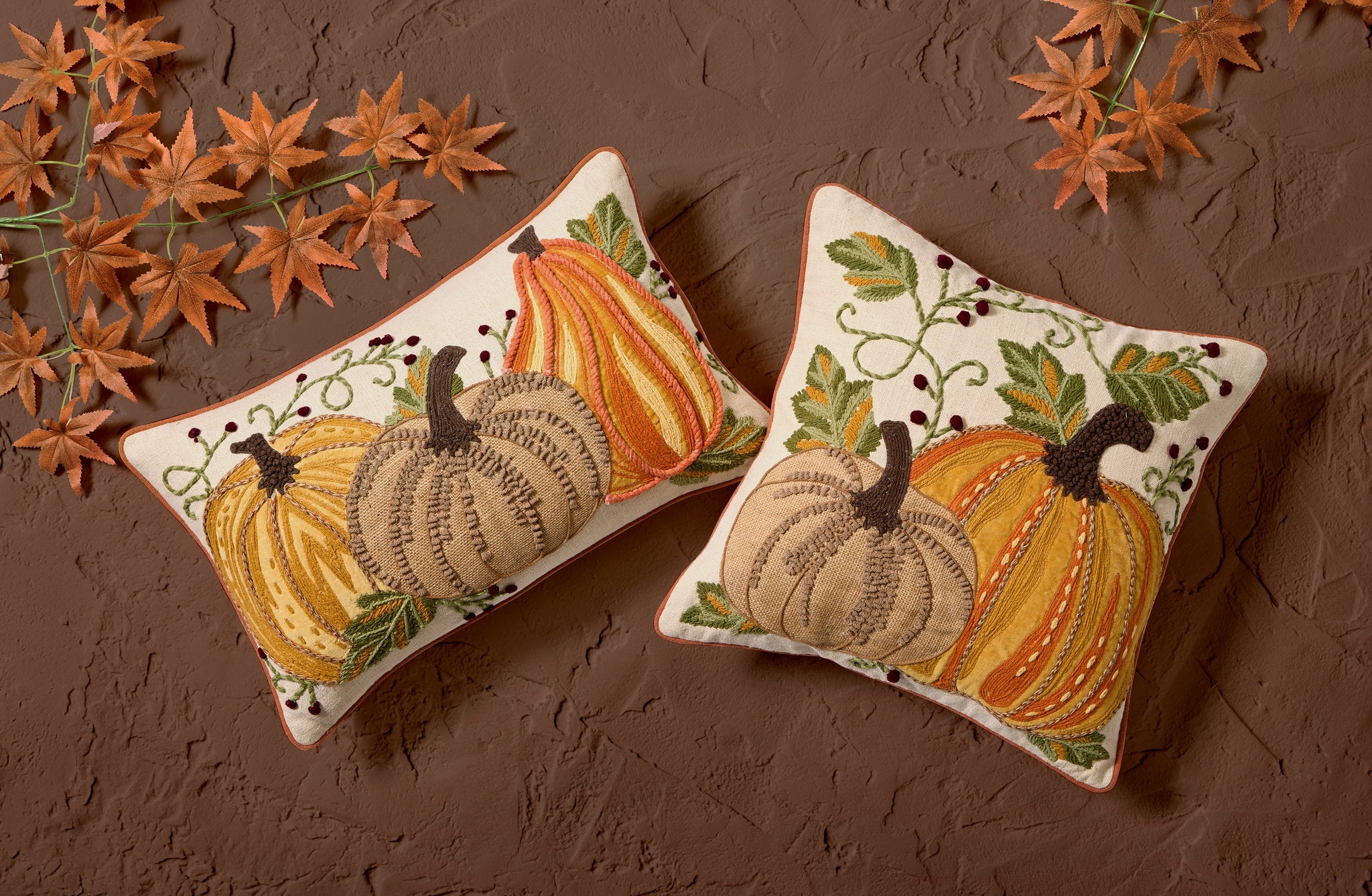 Harvest Pumpkin Duo Embroidered Fall Harvest Throw Pillow shown alongside other designs in the same collection, 16x16 inch