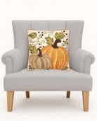 Harvest Pumpkin Duo Embroidered Fall Harvest Throw Pillow on an armchair, showing the throw pillow at room scale, 16x16 inch