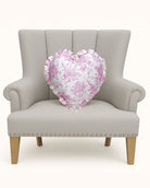 Heart Toile Printed Throw Pillow, 14x14 inch, the pink heart pillow alone on a gray chair