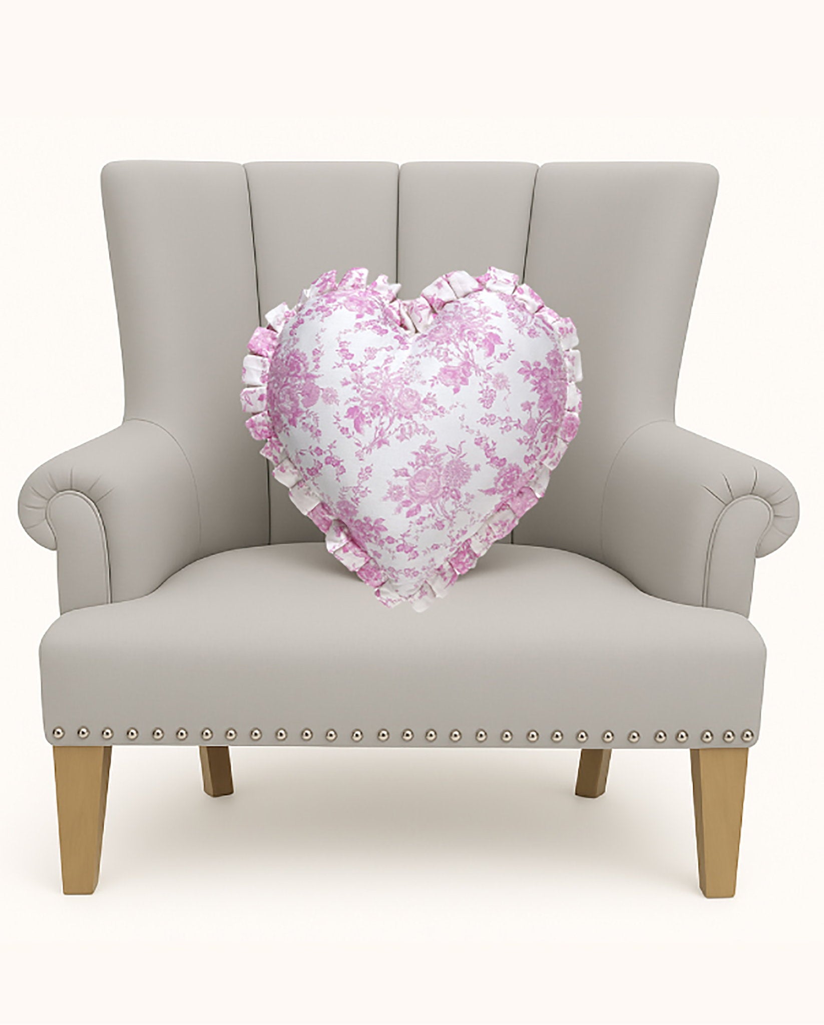 Heart Toile Printed Throw Pillow, 14x14 inch, the pink heart pillow alone on a gray chair