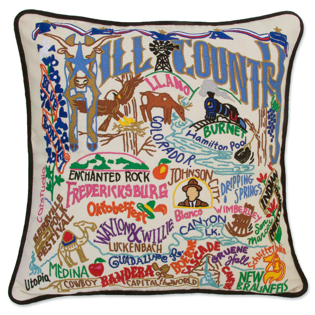 Hill Country Bluebonnets embroidered throw pillow with floral design.