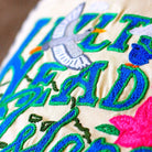 Hilton Head Island Embroidered Throw Pillow - close-up detail of hand-embroidered needlepoint stitching