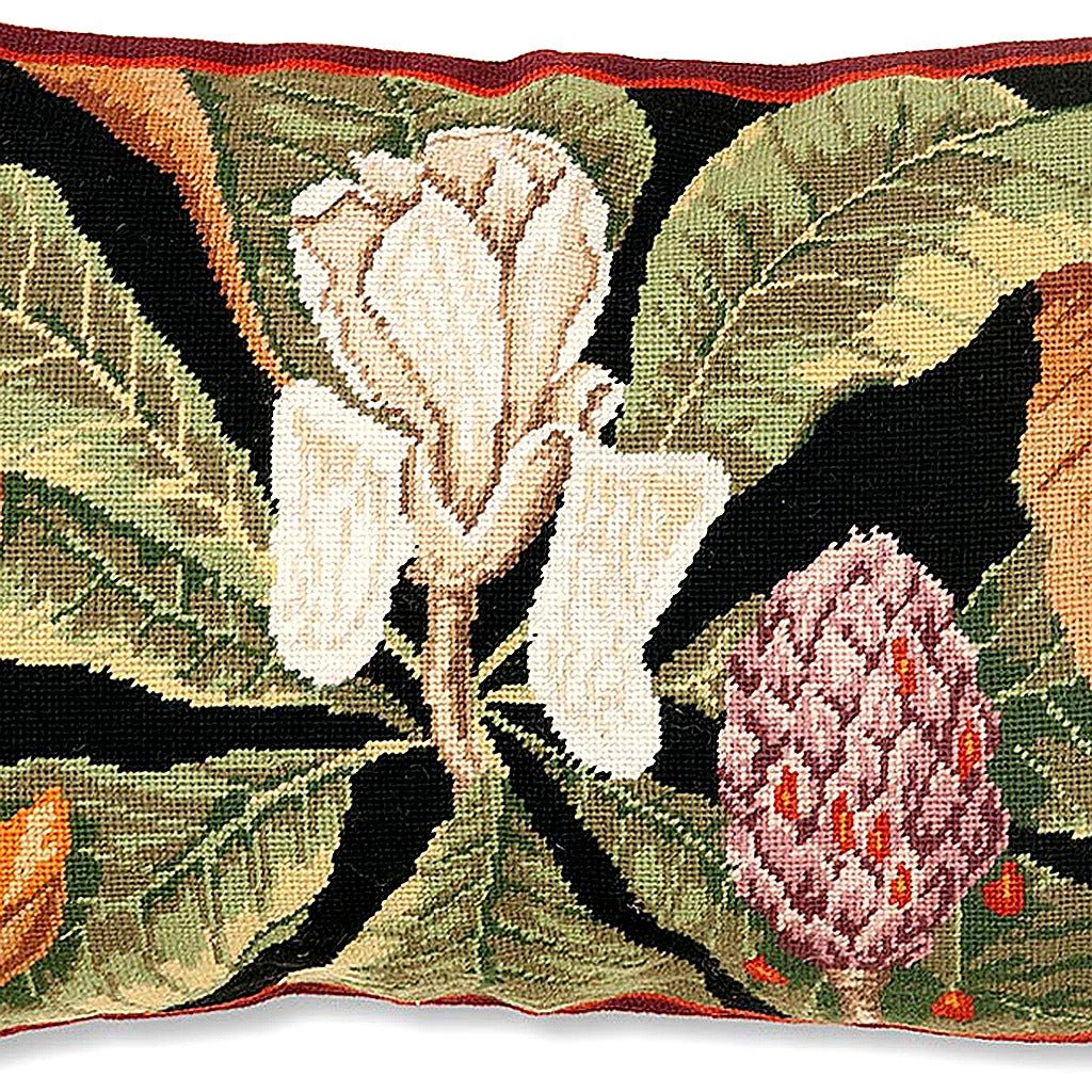 Hand-stitched wool detail of Historic Magnolia Botanical needlepoint pillow showing intricate weave pattern and texture