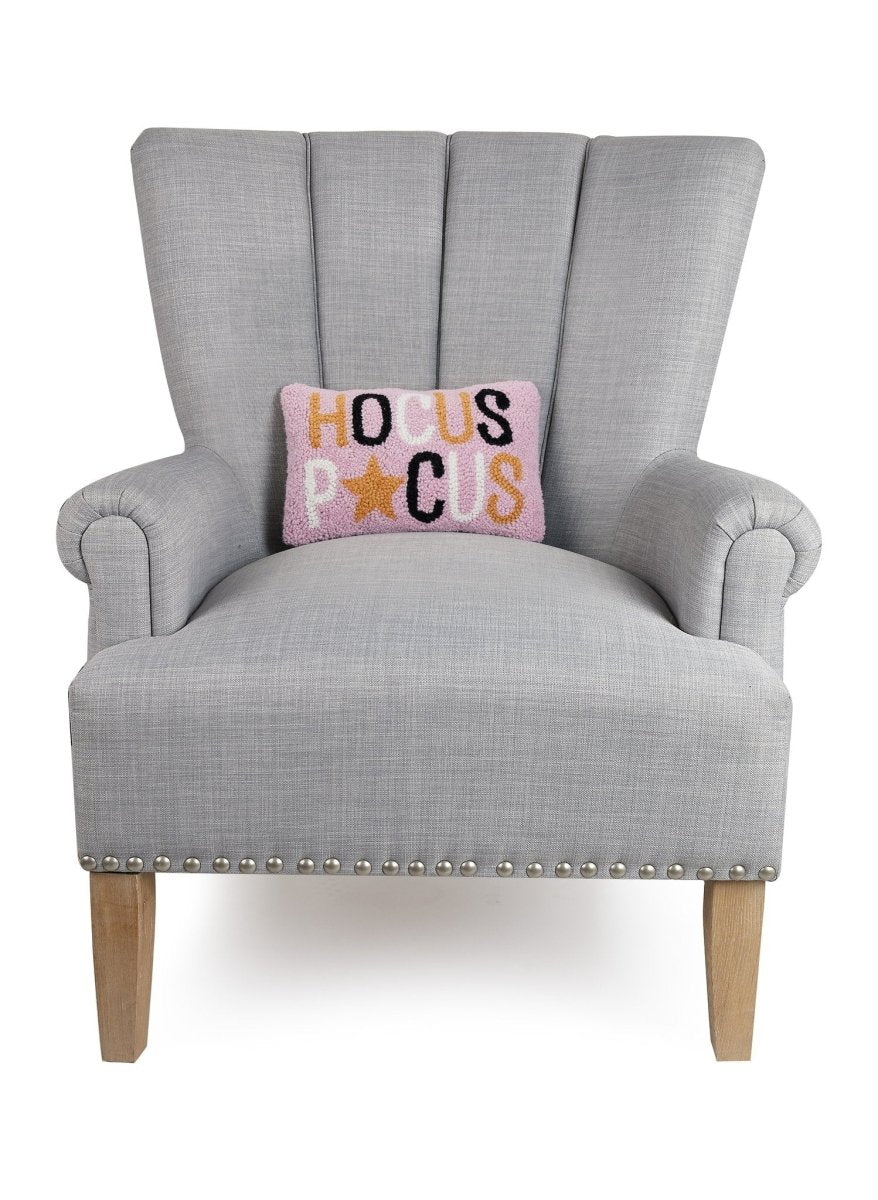 Hocus Pocus Hooked Wool Halloween Throw Pillow on an armchair, showing the throw pillow at room scale, 8x12 inch
