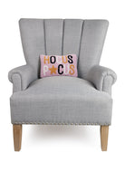 Hocus Pocus Hooked Wool Halloween Throw Pillow on an armchair, showing the throw pillow at room scale, 8x12 inch