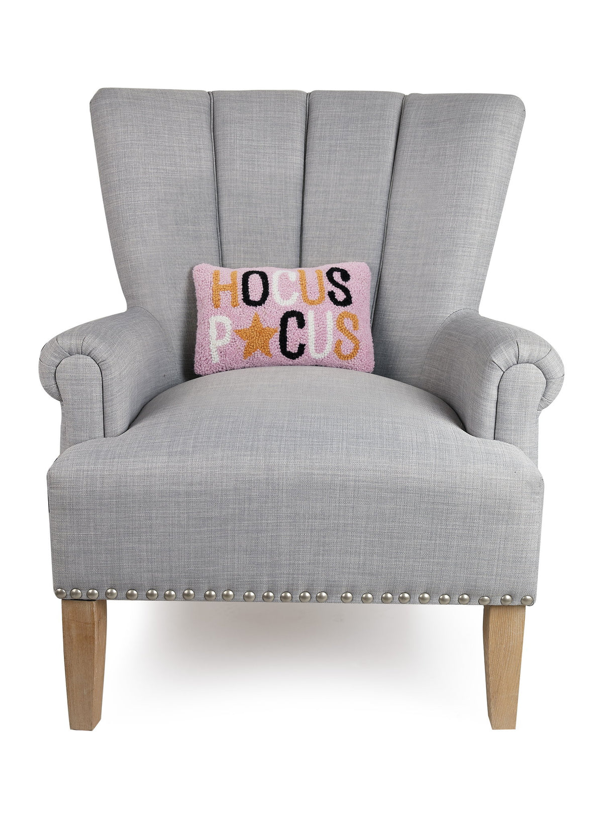 Hocus Pocus Hooked Wool Halloween Throw Pillow on an armchair, showing the throw pillow at room scale, 8x12 inch