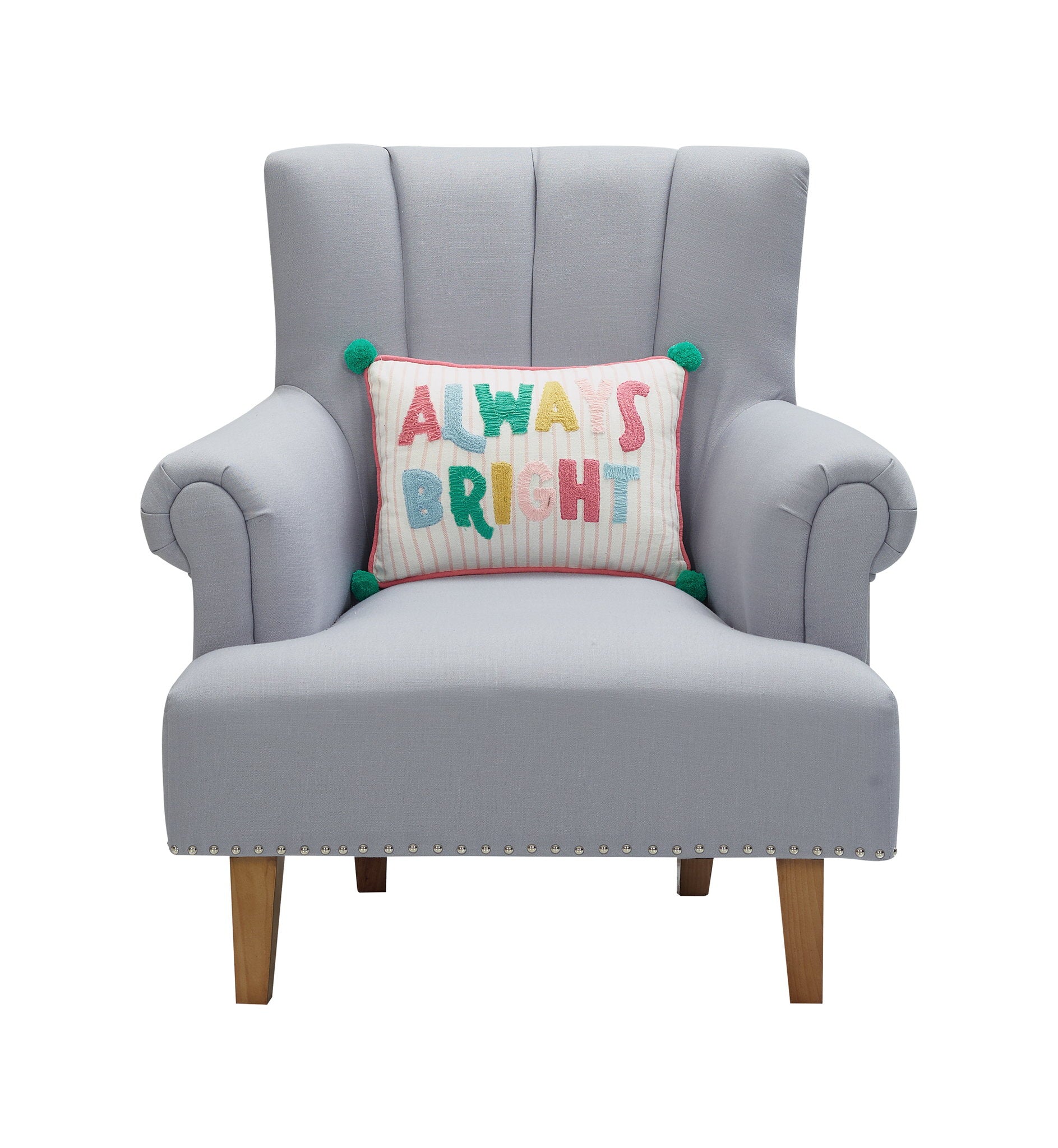 Holiday Bright's Always with Pom Poms Embroidered Throw Pillow, 12x16 inch, lettered lumbar pillow on a gray armchair