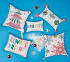 Holiday Bright's Always with Pom Poms Embroidered Throw Pillow, 12x16 inch, five pillows in the group on a blue backdrop