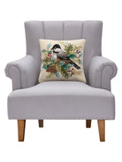 Holiday Chickadee Hooked Wool Throw Pillow on an armchair, showing the throw pillow at room scale, 16x16 inch