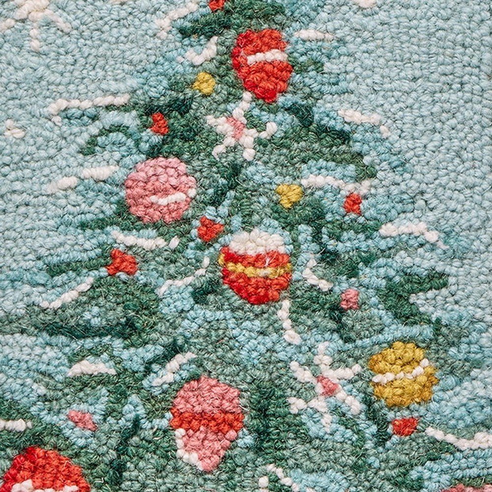 Closeup of Holiday Christmas Tree Hooked Wool Stocking showing stitch texture and craftsmanship detail