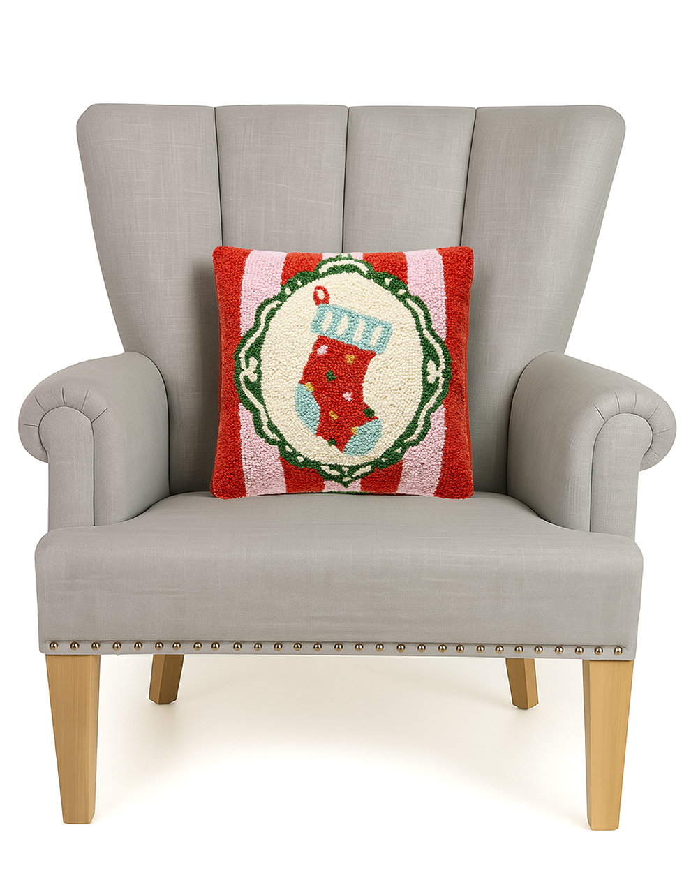 Holiday Frames Hooked Wool Christmas Throw Pillow on an armchair, showing the throw pillow at room scale, 14x14 inch