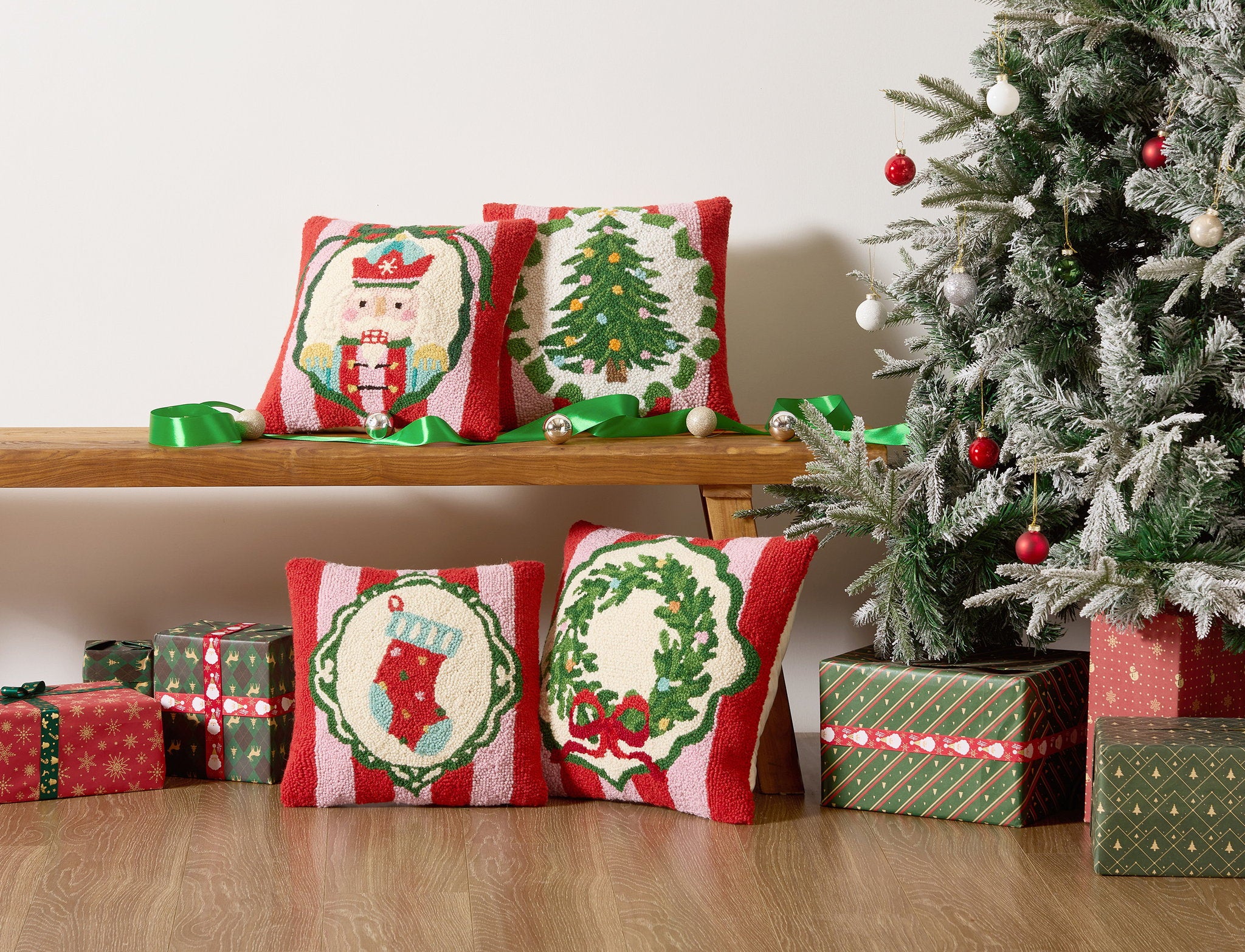Holiday Frames Tree Hooked Wool Christmas Throw Pillow shown alongside other designs in the same collection, 14x14 inch