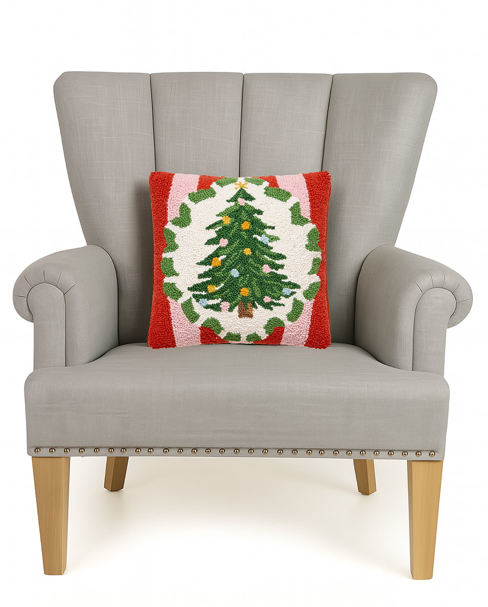 Holiday Frames Tree Hooked Wool Christmas Throw Pillow on an armchair, showing the throw pillow at room scale, 14x14 inch