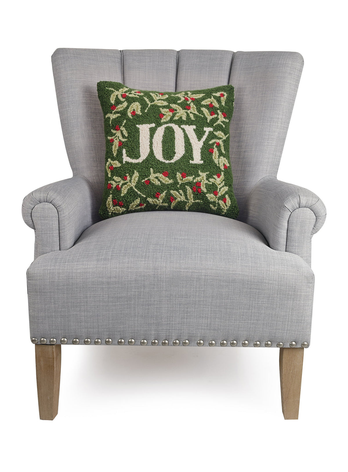 Holiday Joy Hooked Wool Christmas Throw Pillow on an armchair, showing the throw pillow at room scale, 16x16 inch