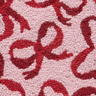 Closeup of Holiday Red Bow Hooked Wool Christmas Stocking showing stitch texture and craftsmanship detail
