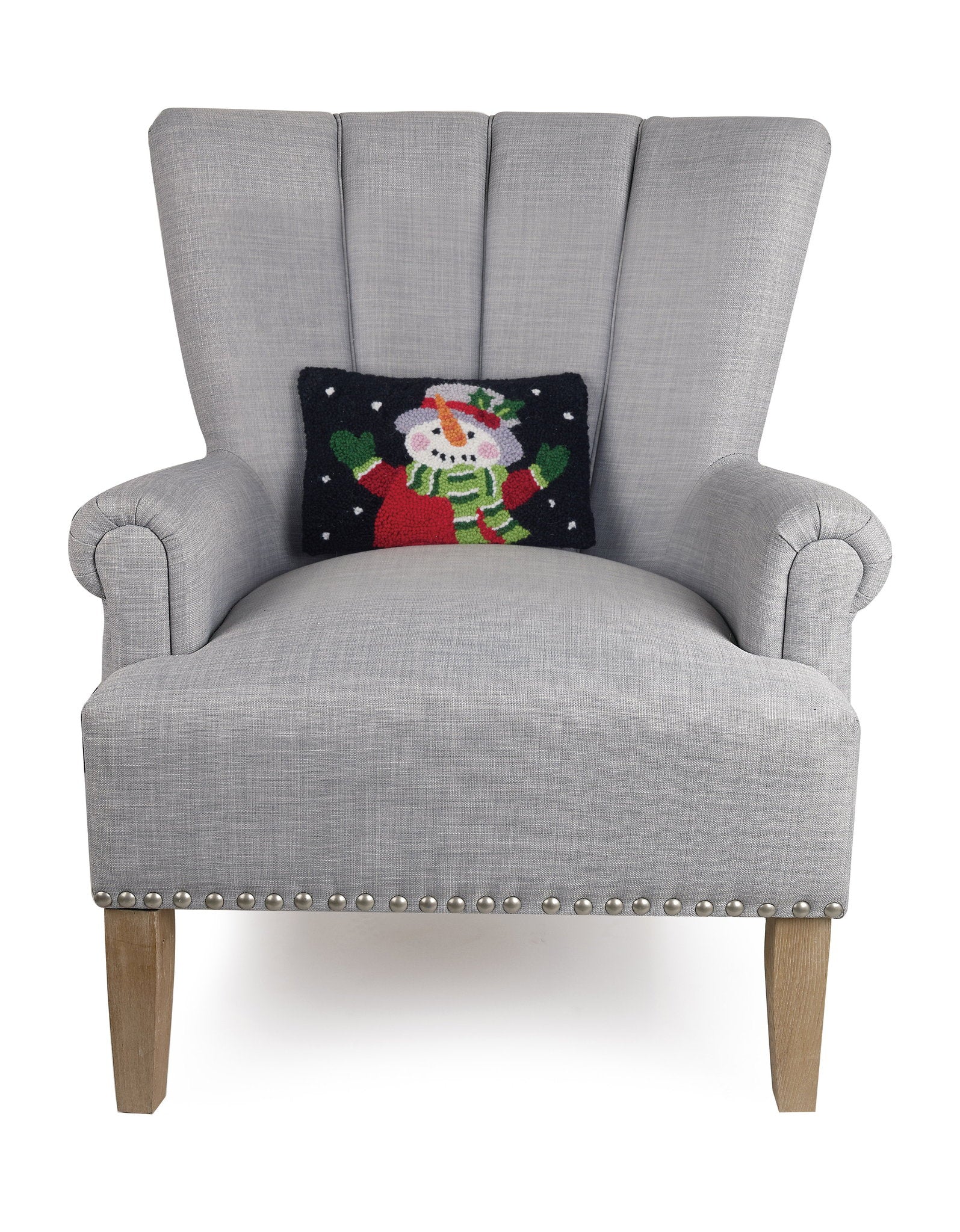 Holiday Snowman Hooked Wool Christmas Throw Pillow on an armchair, showing the throw pillow at room scale, 8x12 inch