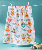 Holiday with Pom Pom Christmas Kitchen Towel styled in a room setting, 18x25 inch