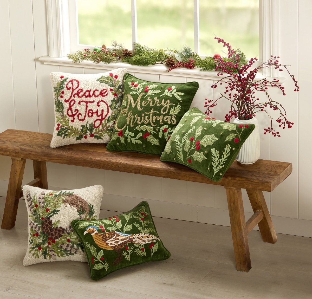Holly Embroidered Christmas Throw Pillow shown alongside other designs in the same collection, 12x18 inch